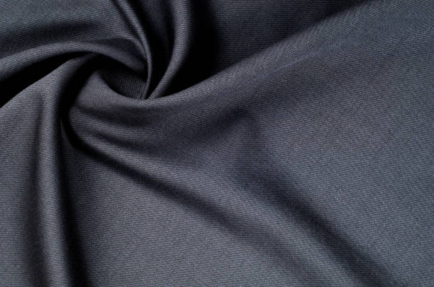 istock Background texture, pattern. cloth wool suit gray. A genuine flannel is always made of carded yarn, carded flannel is ideal in the cold months of the year, it is heavy, cozy and soft. 1067455682