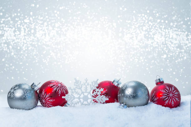 istock Red and silver christmas balls with snow 1067459144