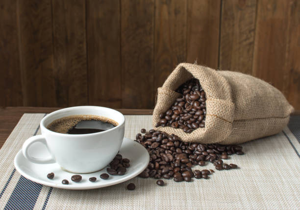 istock Cup of coffee and roasted coffee beans. 1067461740