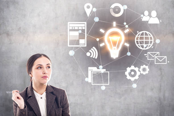 istock Pensive businesswoman with a pen, idea 1067461940