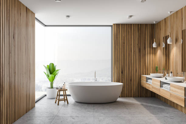 istock Wooden bathroom interior, tub and sink 1067462896