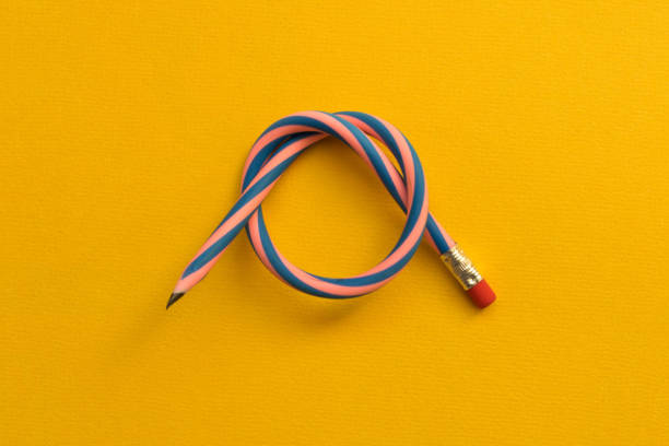 istock Flexible pencil . Isolated on yellow background 1067464186