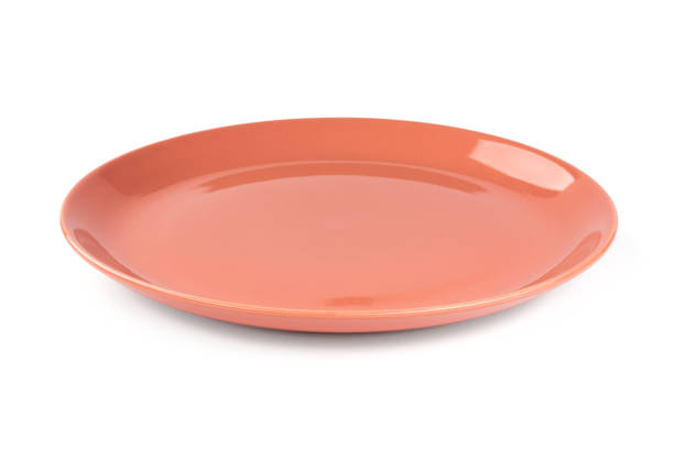 istock Rose red pastel plate isolated on white background 1067474952