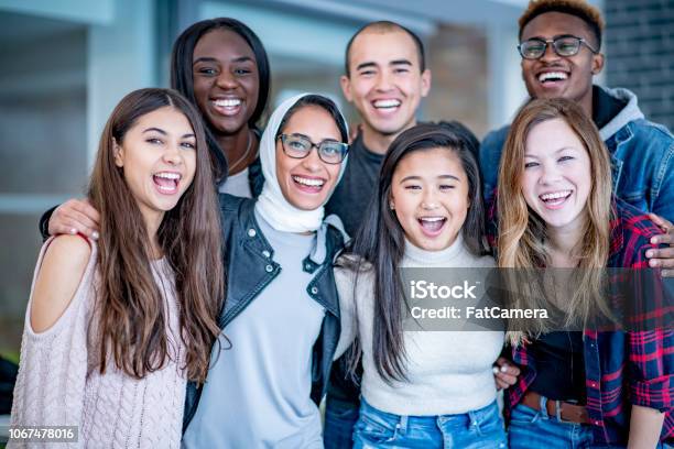 Portrait Of A Group Of Students With Bright Smiles Stock Photo - Download Image Now - Trainee, Multiracial Group, University Student