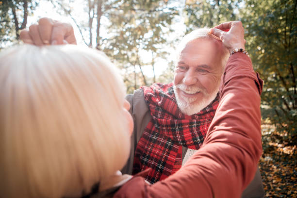 istock Positive nice couple looking at each others face 1067479934