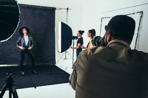 istock Model posing for a photograph during a photo shoot 1067483756