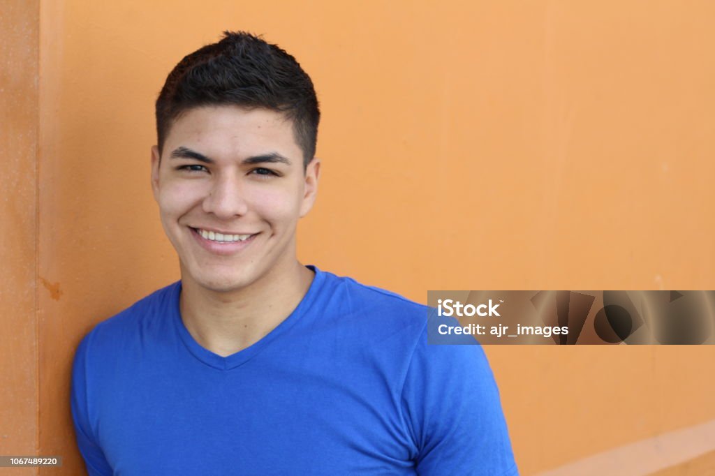 Good looking ethnic young male smiling Good looking ethnic young male smiling with copy space. Teenager Stock Photo