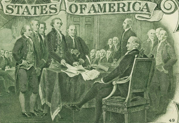 istock Declaration of Independence  engraving on two dollar  closeup 1067494118