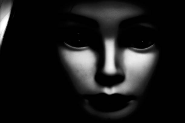 istock Spooky face of black eyed child 1067497010