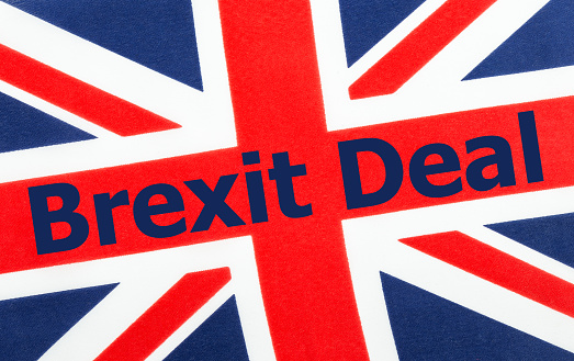 Brexit Deal written on a British Union jack flag. Photograph with added text.