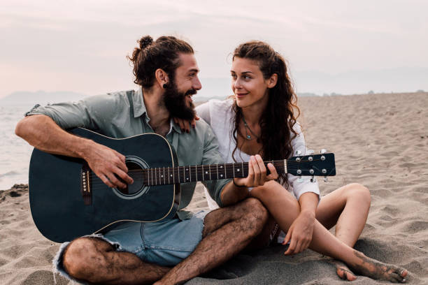 istock Couple playing guitar 1067505966