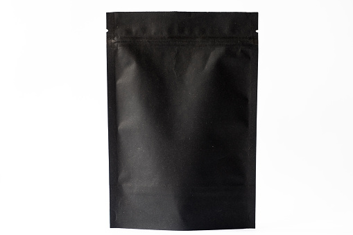 black paper doypack stand up pouch with zipper on white background