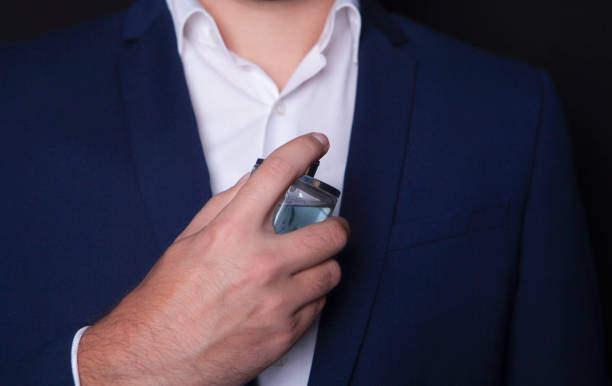 istock businessman and perfume 1067510280