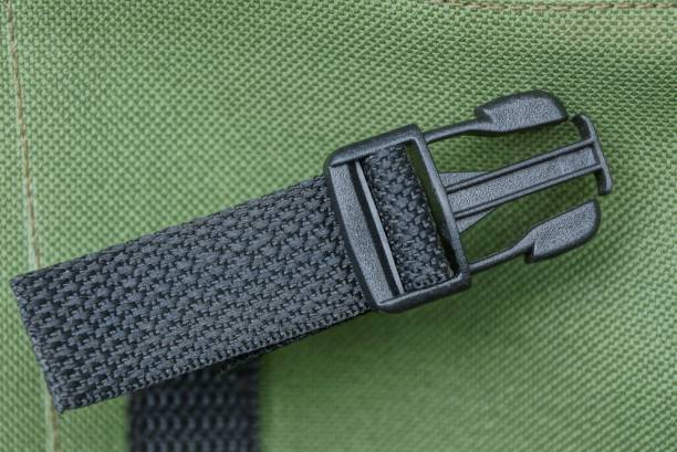 istock one black plastic carbine on a harness on a green fabric backpack 1067510654