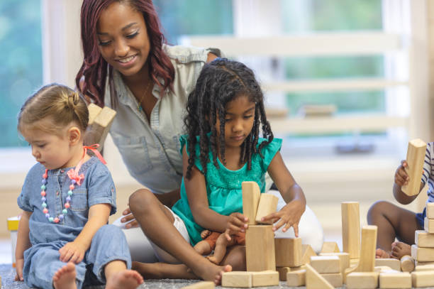 istock Preschool children playing with blocks 1067510842