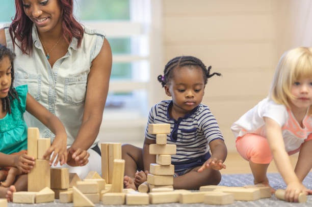 istock Preschool children playing with blocks 1067510844