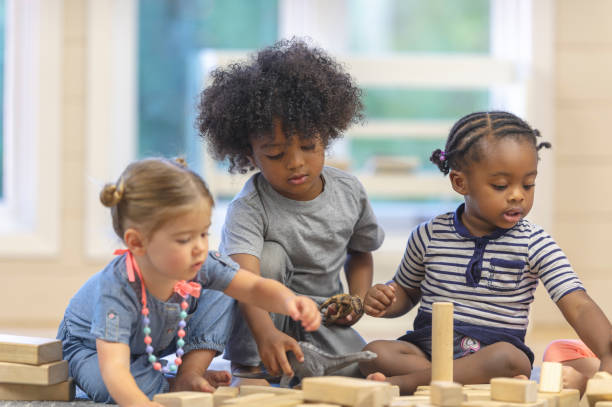 istock Preschool children playing with blocks 1067510856