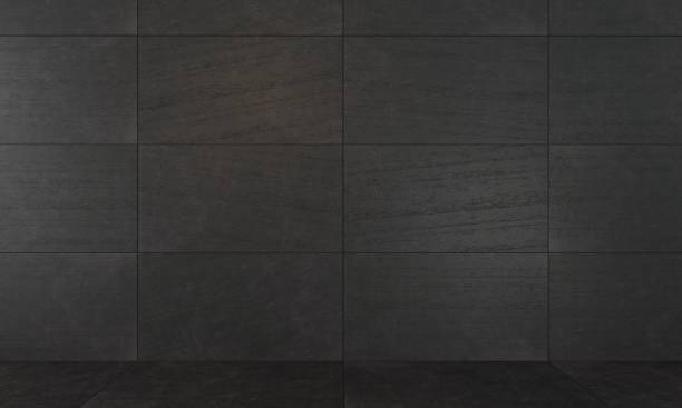 istock Background dark wall of concrete slabs 1067512432