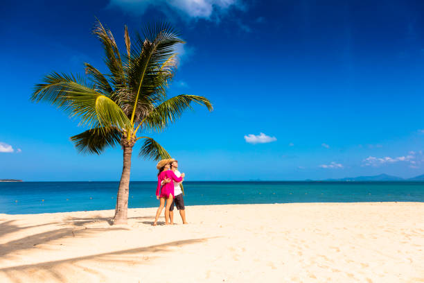 istock Couple on tropical beach 1067513248