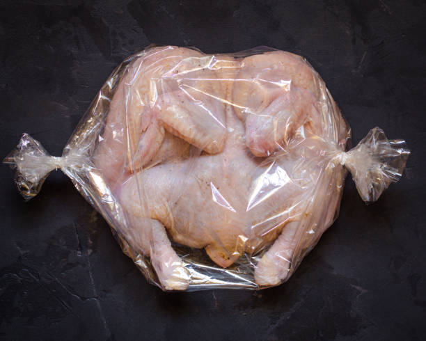 istock raw chicken - whole roasted chicken (chicken meat). Top view with copy space 1067523804