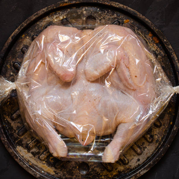 istock raw chicken - whole roasted chicken (chicken meat). Top view with copy space 1067523826