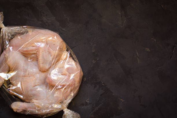 istock raw chicken - whole roasted chicken (chicken meat). Top view with copy space 1067523830