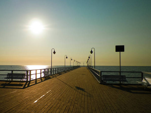 istock Sunrise over pier in Gdynia, Poland. 1067528494