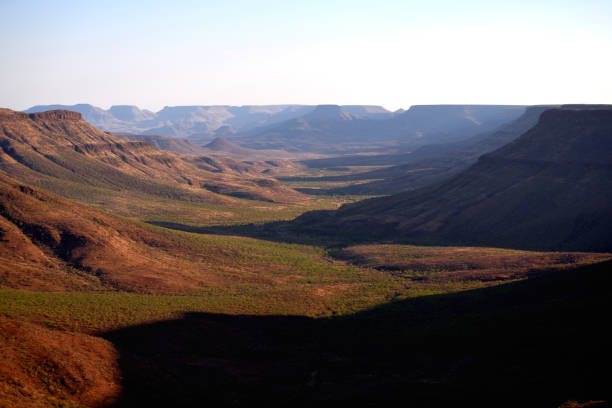 istock Shadows at sunset over the Klip River Valley, Etendeka Plateau, Namibia. 1067535038