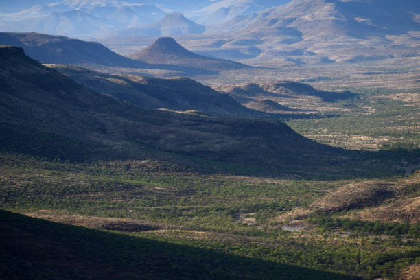 istock Shadows at sunrise over the Klip River Valley, Etendeka Plateau, Namibia. 1067536448