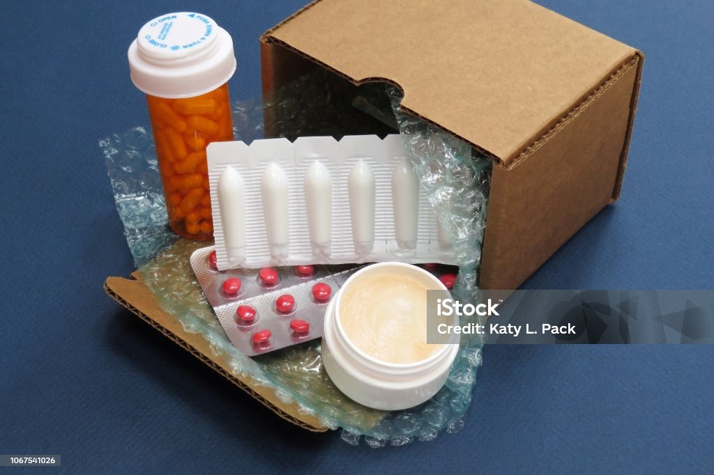 Mail Order Pharmacy Horizontal image of prescription medications shipped in a cardboard box from a mail order (online) compound pharmacy Home Shopping Stock Photo