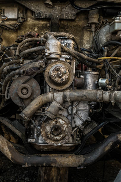 istock Worn out engine of an old car. Front view close-up. 1067541252