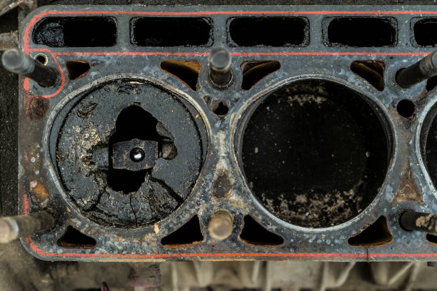 istock Worn out old engine with a broken piston in the cylinder. Close-up. Top view. 1067543536
