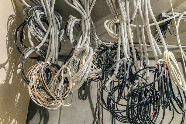 istock Bundles of electrical cables and wires close-up. Electrical installation. 1067544714