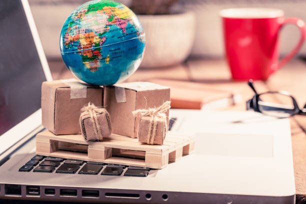 istock Close-Up Of Containers And Globe On Laptop 1067548450