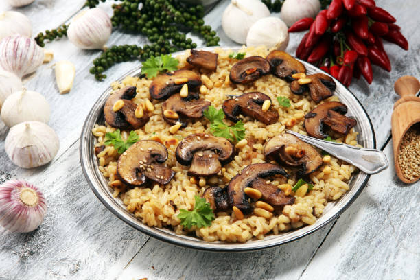 istock risotto with mushrooms, fresh herbs and parmesan cheese 1067551202