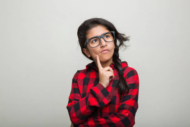 istock Young Girl Facial Expression - Stock image 1067551220