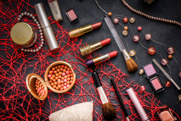 istock Women's cosmetics on a dark graphite background 1067554866