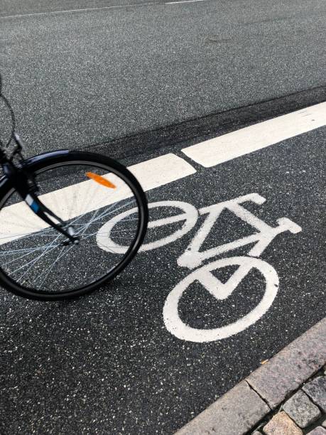 istock Bicycle wheel on bike path 1067564226