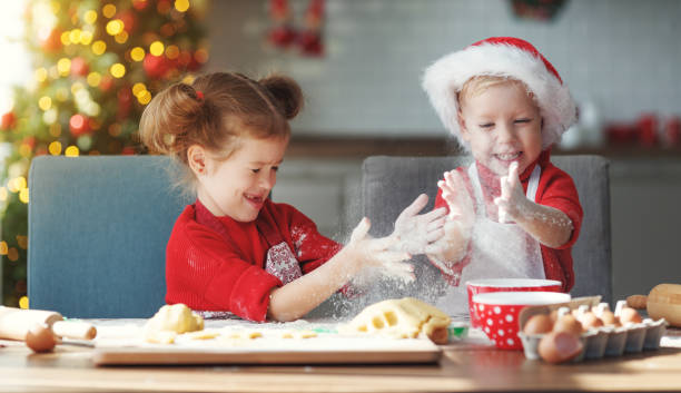 istock happy children bake christmas cookies 1067568928