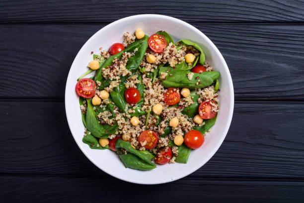istock Spinach salad with quinoa , tomatoes and chickpea 1067569006