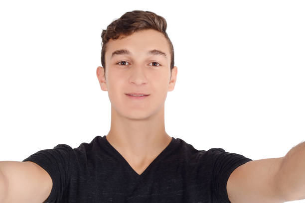 istock Portrait of a young man taking a selfie 1067573290