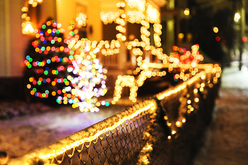 blurred background city street with Christmas illuminations. Cope space for your text