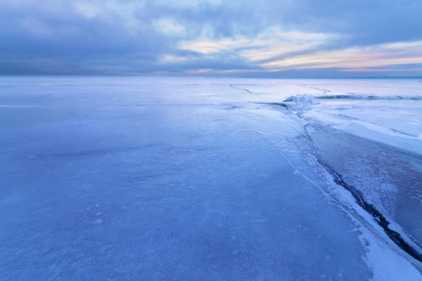 istock crack in the ice a cloudy sunset 1067578400