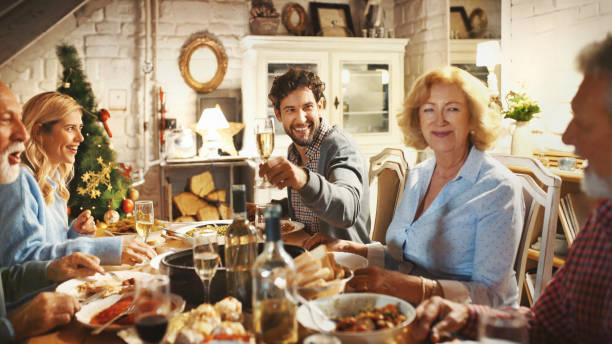 istock Family having Thanksgiving dinner. 1067578782