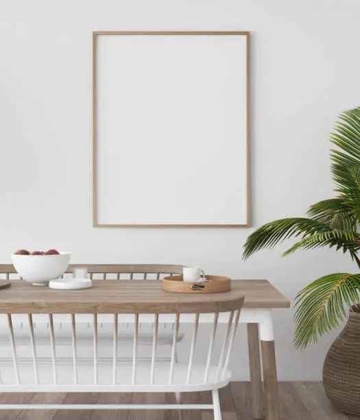 Photo of Mock-up poster in tropical living room background, Scandi-boho style