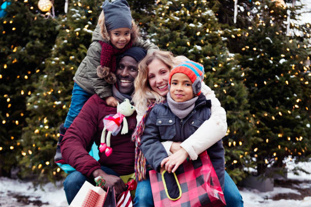 istock Christmas shopping with multi-ethnic family 1067584662