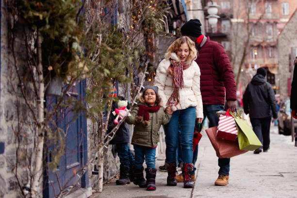 istock Christmas shopping with multi-ethnic family 1067584736