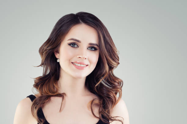 istock Friendly young woman smiling. Young female face 1067587008