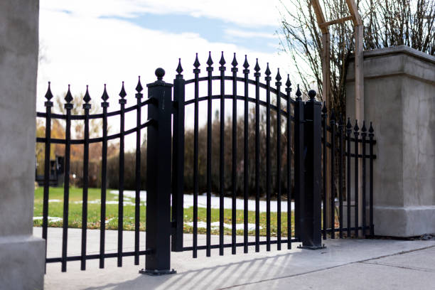 Black iron fence gate stock photo