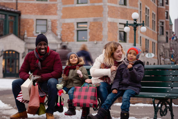istock Christmas shopping with multi-ethnic family 1067591332